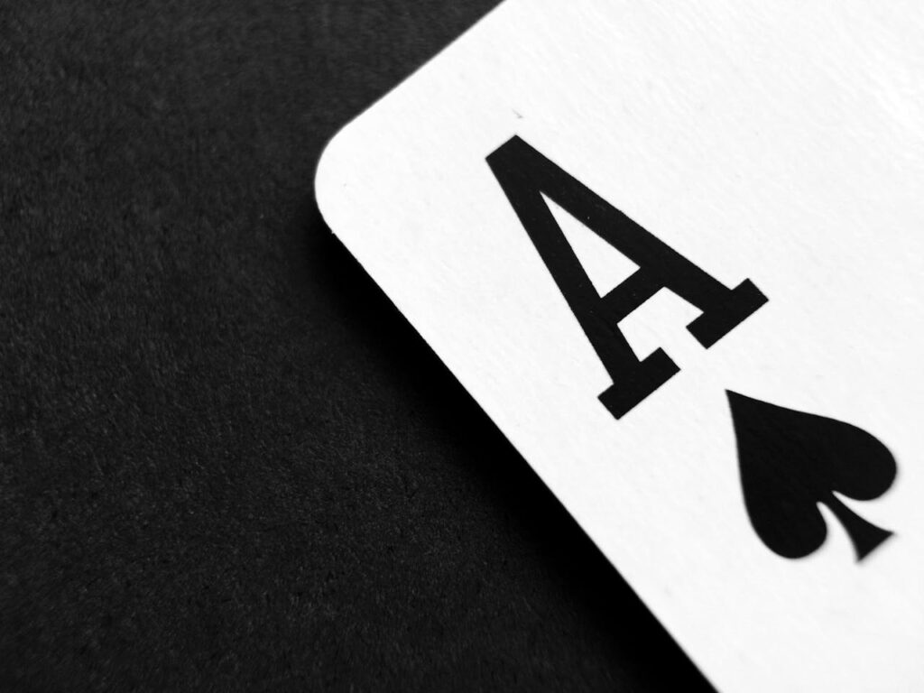 pexels photo 262333 Detailed view of an Ace of Spades card symbolizing luck and strategy.